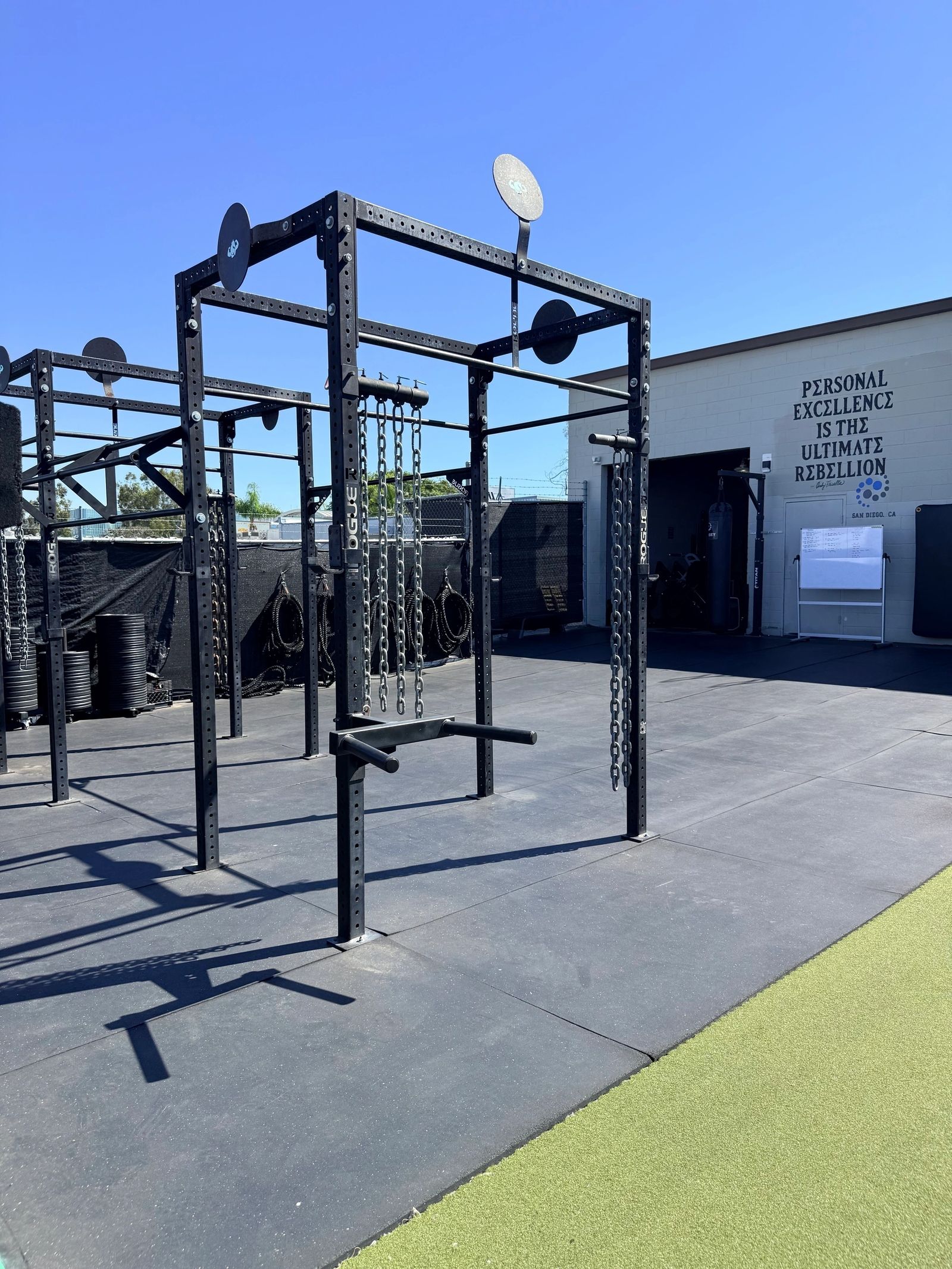 Odyssey's outdoor rig with pull-up bars, chains and open training space